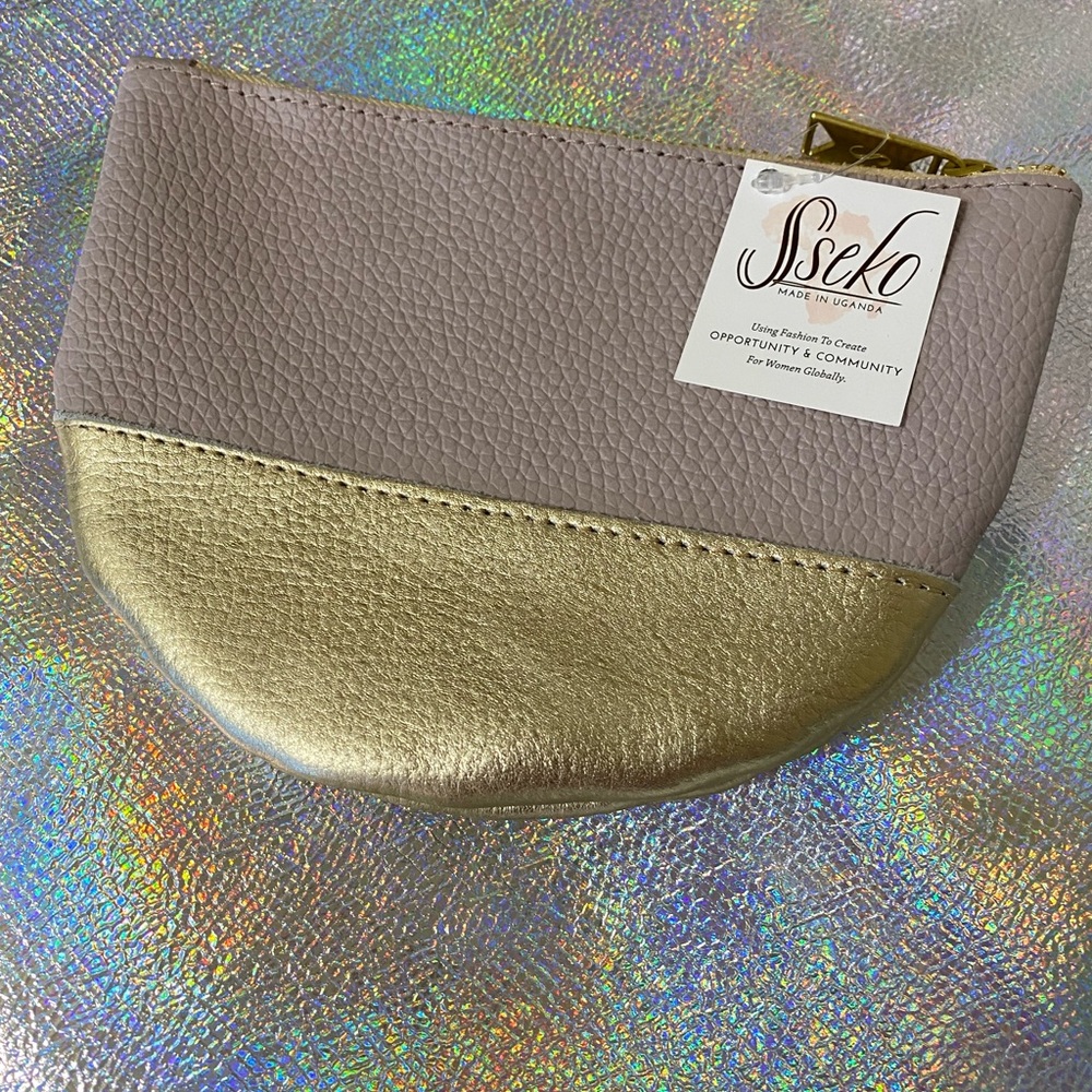 Sseko medium moon clutch . Lavender and gold. NWT